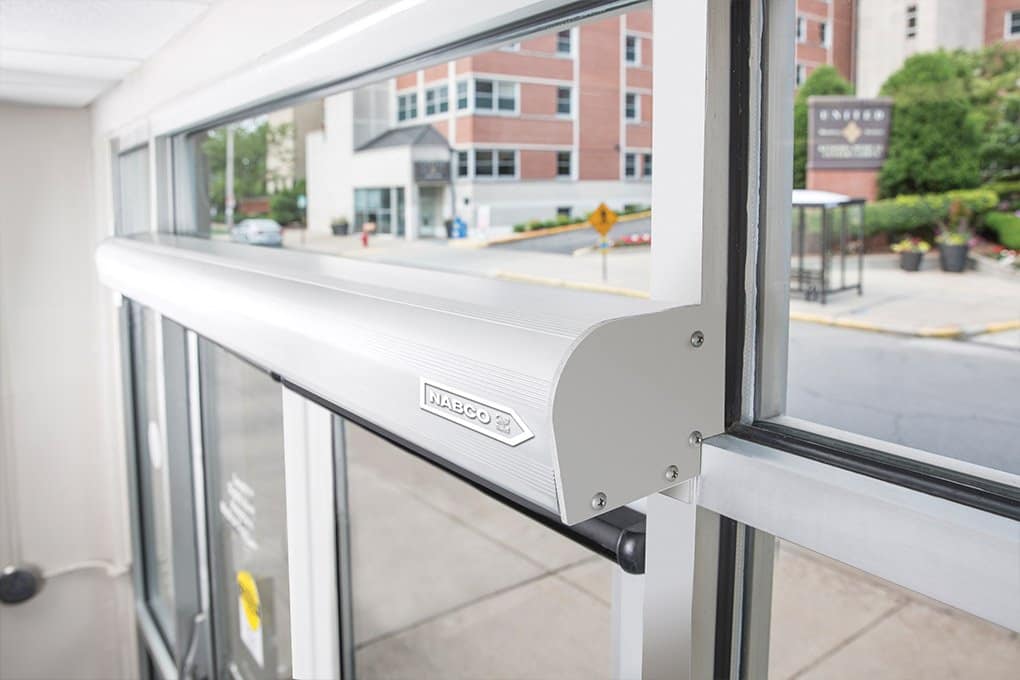 Low energy automatic door opener